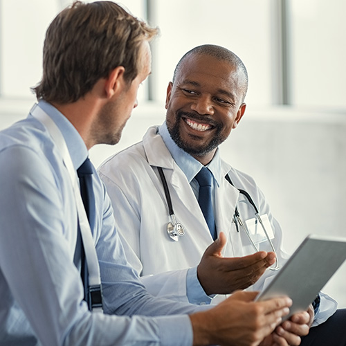 a doctor consulting with a DataDx expert