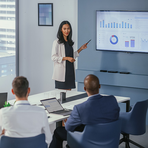 a person giving a presentation of DataDx reporting data